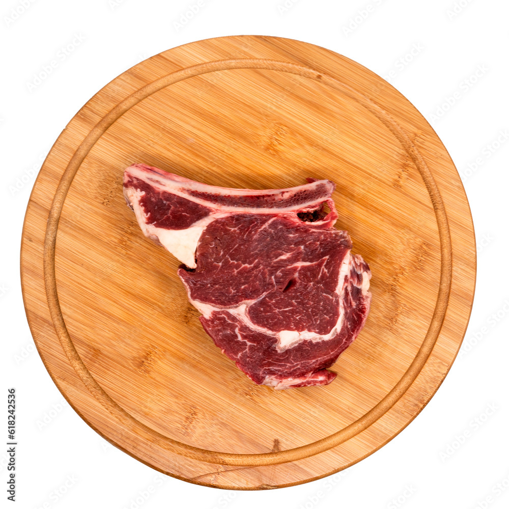 T-bone steak on a wooden board T-bone steak on a wooden board