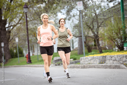 Two Females Runner Jogging Outdoor Workout together