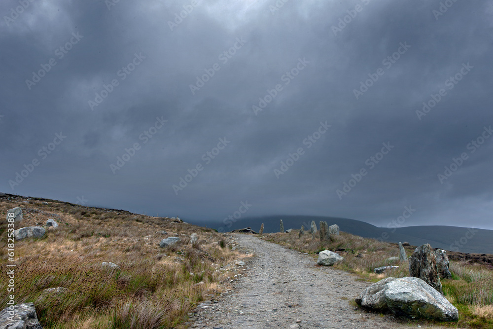 Westcoast Ireland. Achill island, Amethyist. Rocks in landscape. Rainclouds.