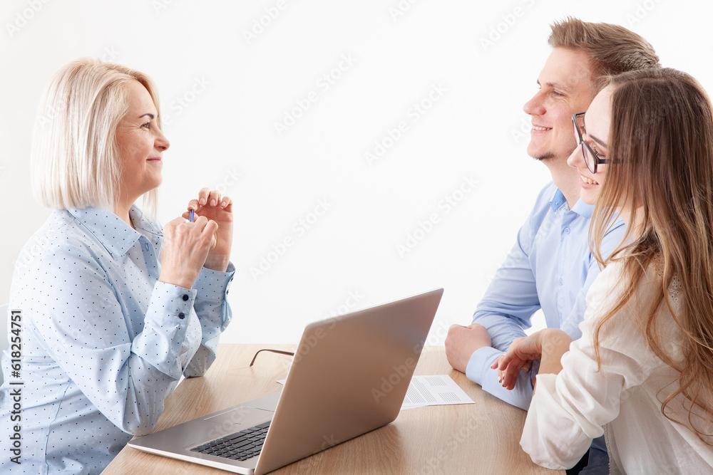 Snapshot featuring business partners discussing documents and ideas at a meeting Snapshot featuring business partners discussing documents and ideas at a meeting