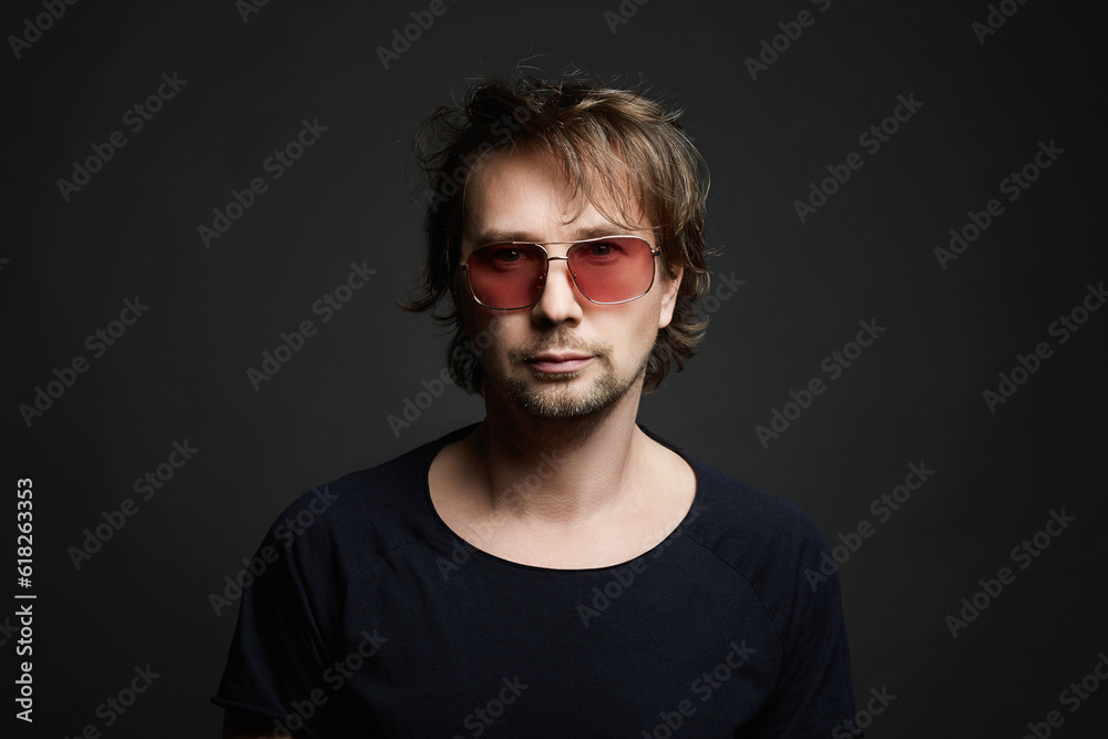 Handsome long Hair Man in glasses. funny bearded Boy