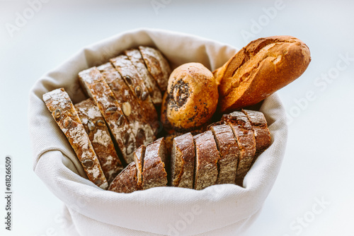 Sliced bread in linen bread box bread storage photo