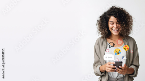 Girl using social media on her phone and smiling with copy space for your advertisement photo