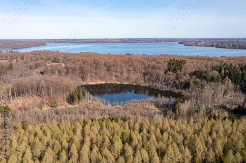 Bagsvaerd, Denmark - April 20, 2022: Aerial drone view of Store Hulsoe Lake with Furesoe Lake in the background. photo