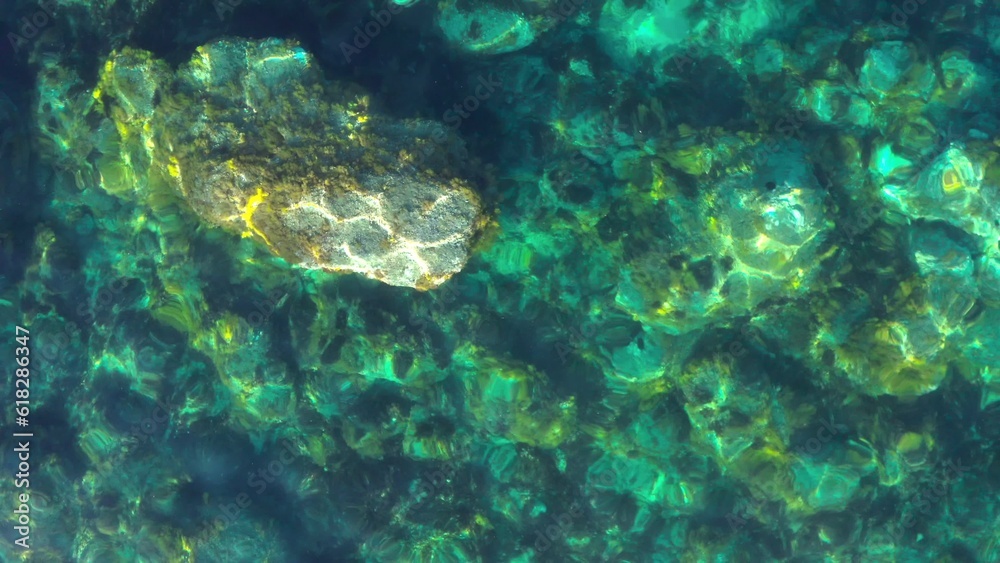 Fototapeta premium Wide aerial of ligurian sea coast, transparent shallow turquoise water. Aerial view above from drone. Ligurian coast, province of Savona, Italy