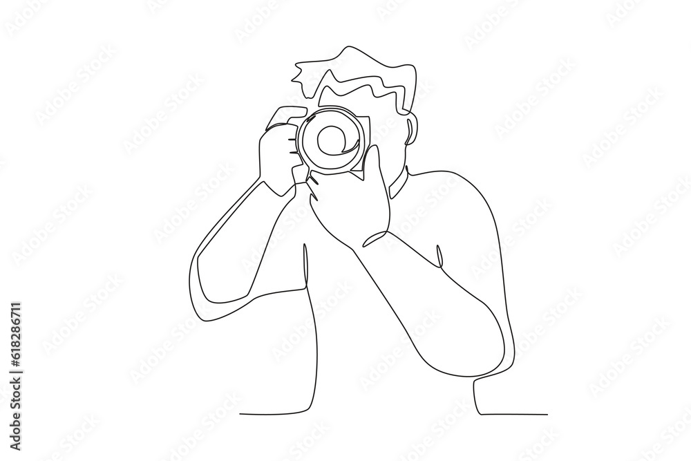 A man takes a photo. World photography day one-line drawing A man takes a photo. World photography day one-line drawing