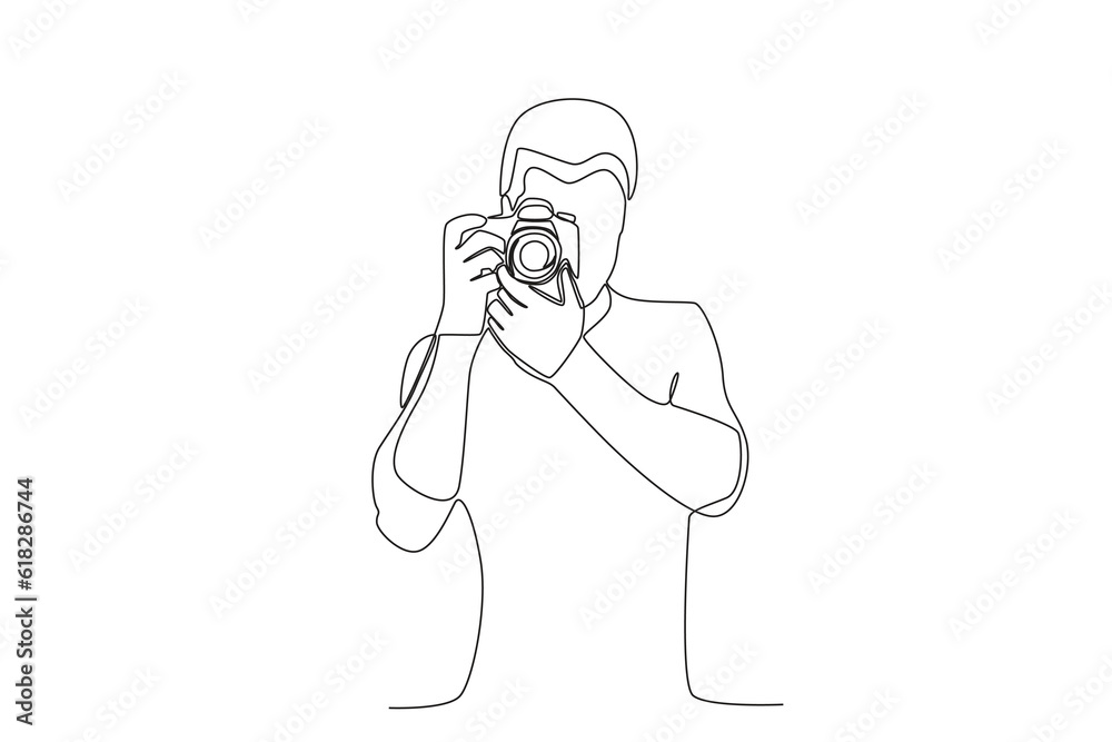 A man captures the image with a camera. World photography day one-line drawing