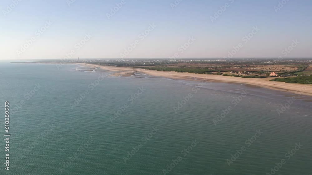 Drone view of a clean beach in Gujarat, India. Drone view of a clean beach in Gujarat, India.
