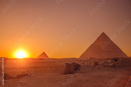 Pyramids of Giza in Cairo Egypt sunset sky, travel Egyptian