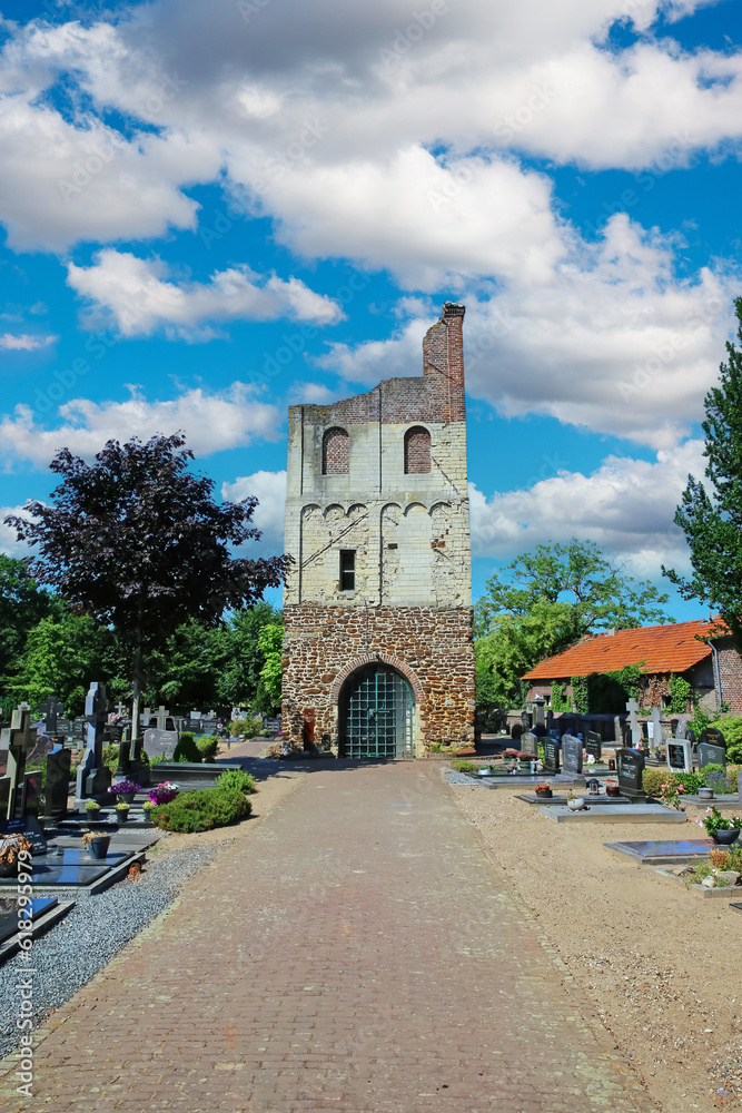 Oud Bergen (Limburg), Netherlands - Juin 9. 2023: Beautiful dutch cemetery with medieval old church tower ruin in summer