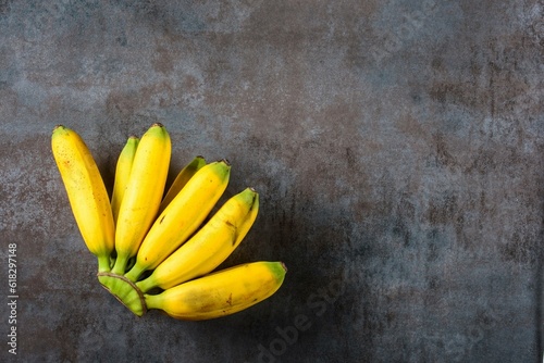 Striking Top Close-Up of Bananas on Dark Background, Captured in Stunning 4K Resolution