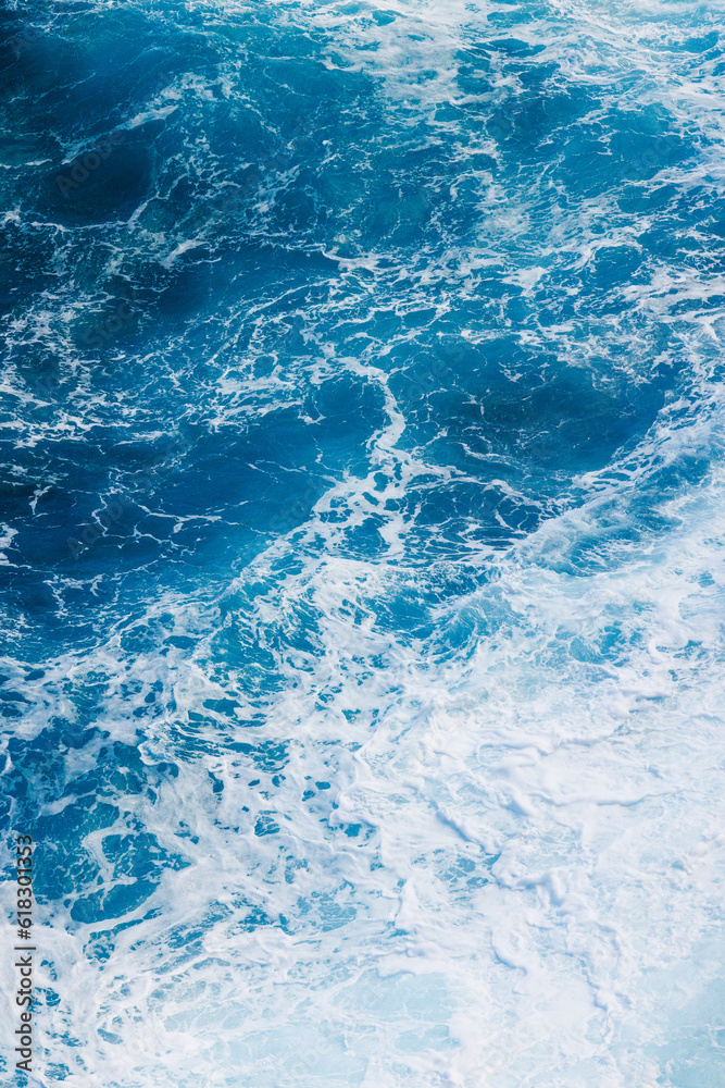 Blue Water Crashing in Wide Ocean Background