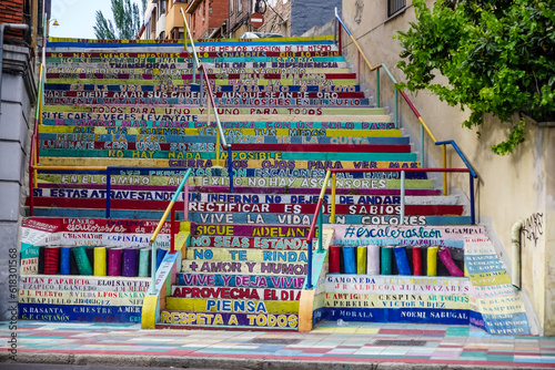Staircase painted in bright colors with positive phrases
