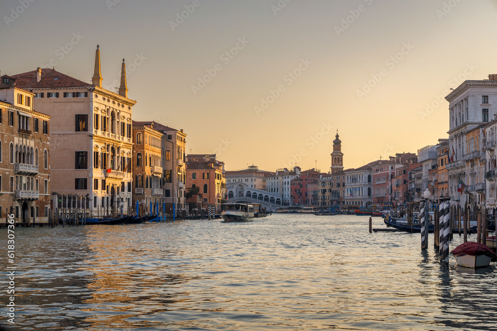 The Grand Canal with Rialto bridge in Venice at a beautiful sunny morning, Italy, Europe.