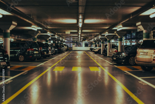 Modern underground parking with cars