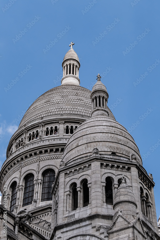 Detail of Paris Basilica Sacre Coeur at top of Montmartre - Roman Catholic Church and minor basilica, dedicated to Sacred Heart of Jesus. Paris, France.