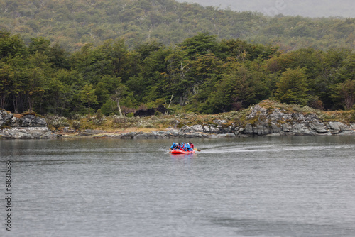 Tourists on a zodiac excursion in Tierra Del Fuego National Park in souther Argentina