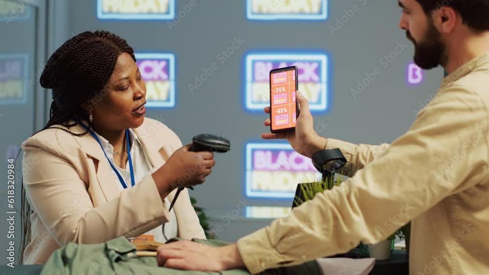 Customer uses mobile loyalty program app at checkout counter in ...
