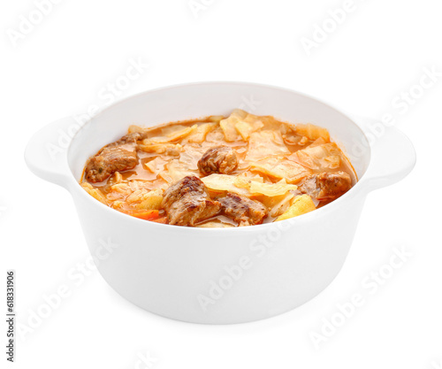 Tasty cabbage soup with meat and carrot on white background