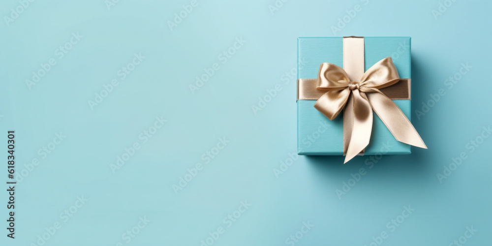 Gift box with satin ribbon and bow on blue background. - Generative AI Gift box with satin ribbon and bow on blue background. - Generative AI