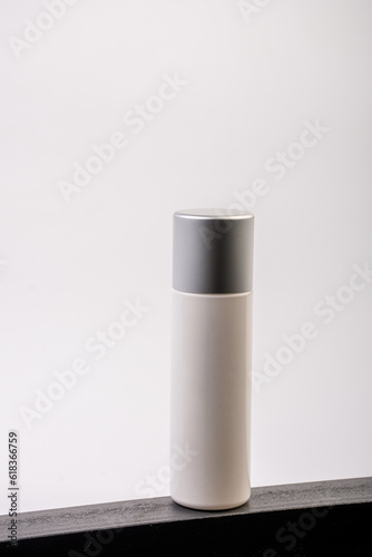 Cosmetic product in tube, bottle, lotion or serum on white background.