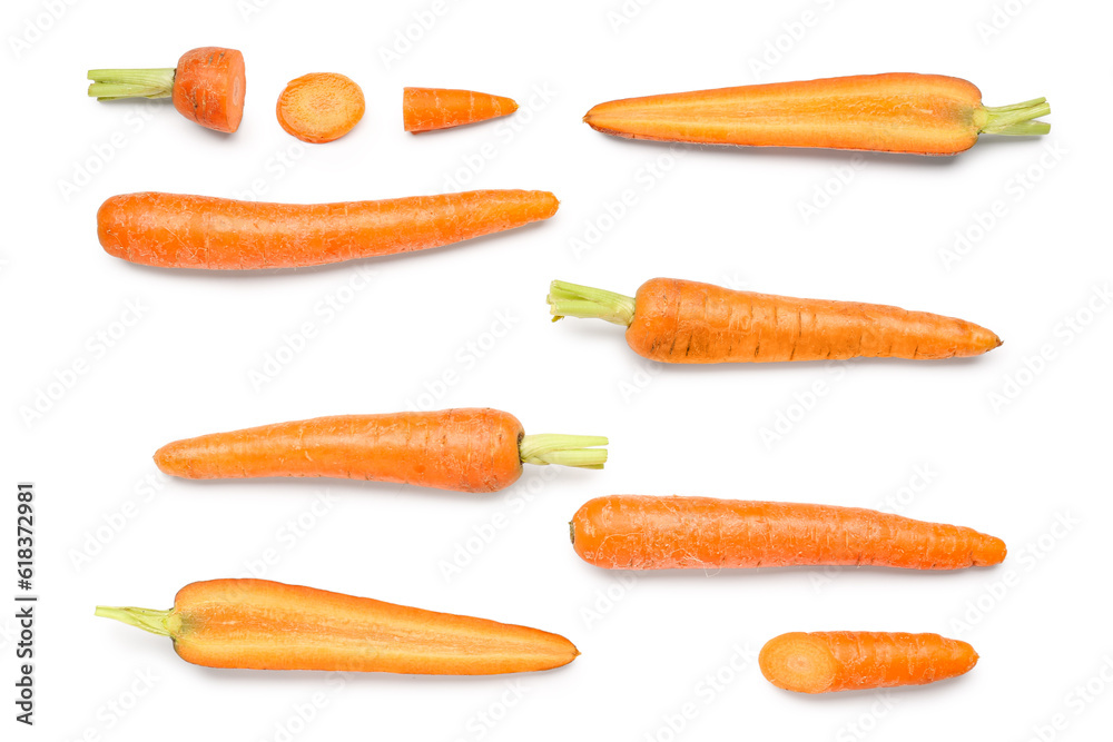 Fresh carrots and slices on orange background Fresh carrots and slices on orange background