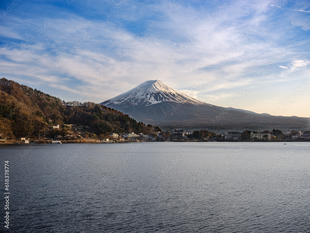 mount fujiyama, fuji behind the lake with clouds and sakura