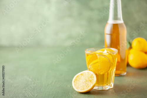 Tableau sur toile Boozy Refresing Cold Lemon Deer or Radler in a Pint Glass  on wooden table