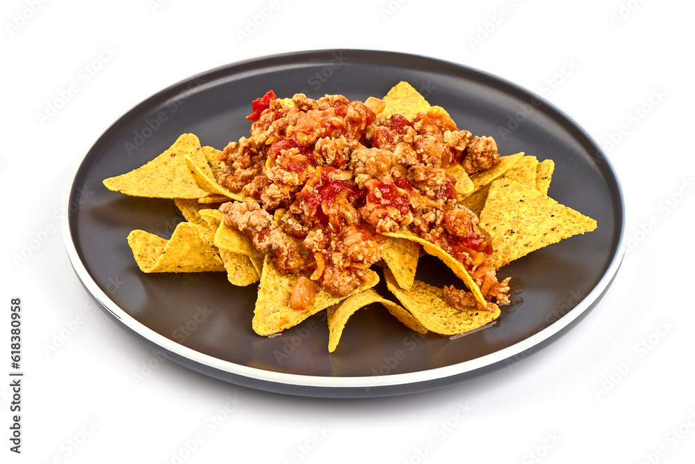 Plate of corn chips nachos with fried minced meat and cheese, isolated on white background. Plate of corn chips nachos with fried minced meat and cheese, isolated on white background.
