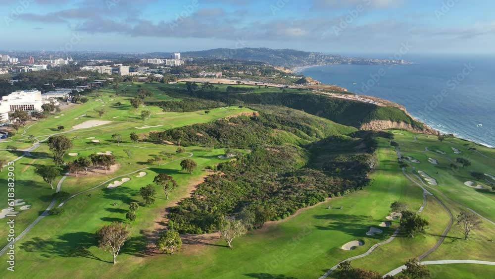 Torrey Pines Golf Course Aerial view flying away from Pacific Ocean and cliffs.
