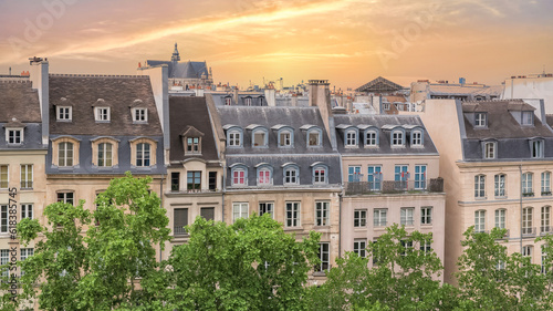 Paris, aerial view of the city, beautiful ancient facades, sunset

