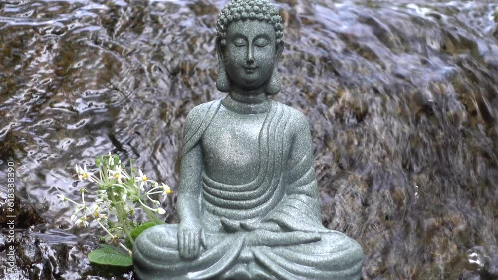 Buddha statue on the background of nature - sunset over the sea, water flows from a bamboo stalk. Mini fountain for relaxation, meditation. Buddha statue on the background of nature - sunset over the sea, water flows from a bamboo stalk. Mini fountain for relaxation, meditation.