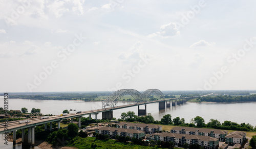 Big beautiful bridge across the river on a cloudy summer day. Bridge in Memphis, Tennessee aerial view on spring day