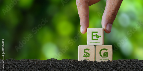 Concepts of ESG, environment, society and governance environmental social connections related icons Zero net greenhouse gas emissions target Long-term, climate-neutral strategy Drop wooden cube photo