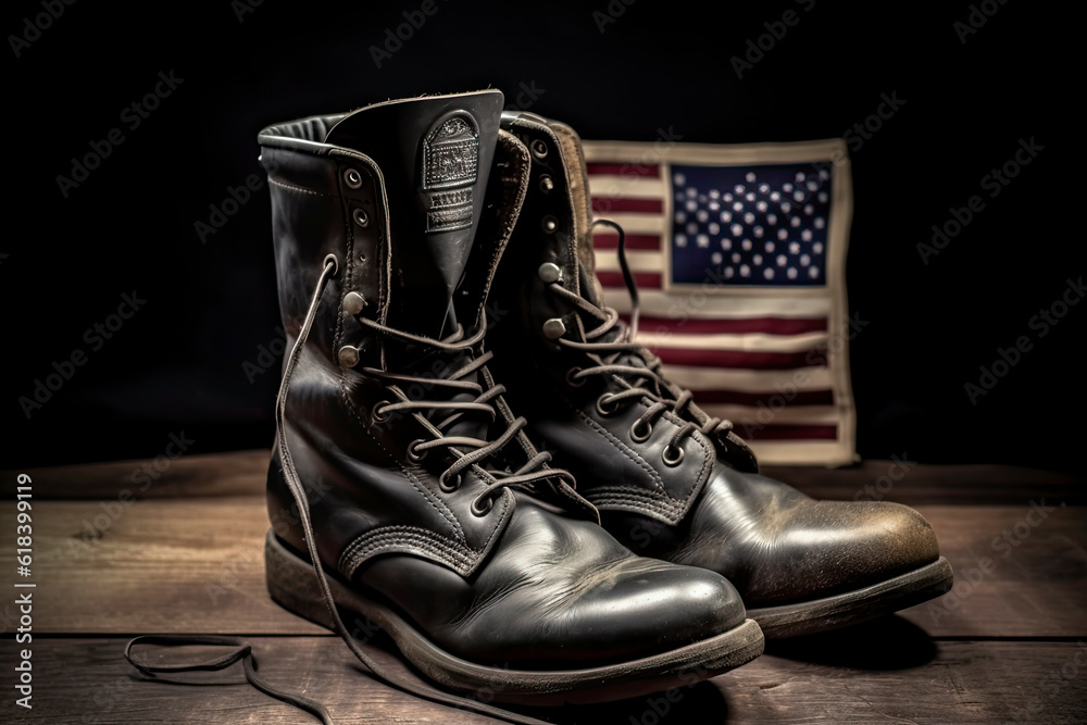 Old military combat boots with dog tags and two small American flags.AI ...