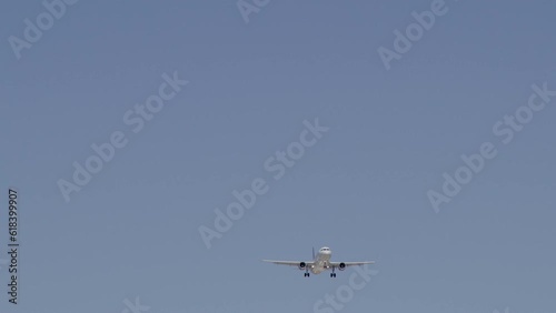 Slow motion close-up view of a commercial aircraft slowly approaching las Vegas airport View from ground up. Nevada USA 4K High-quality