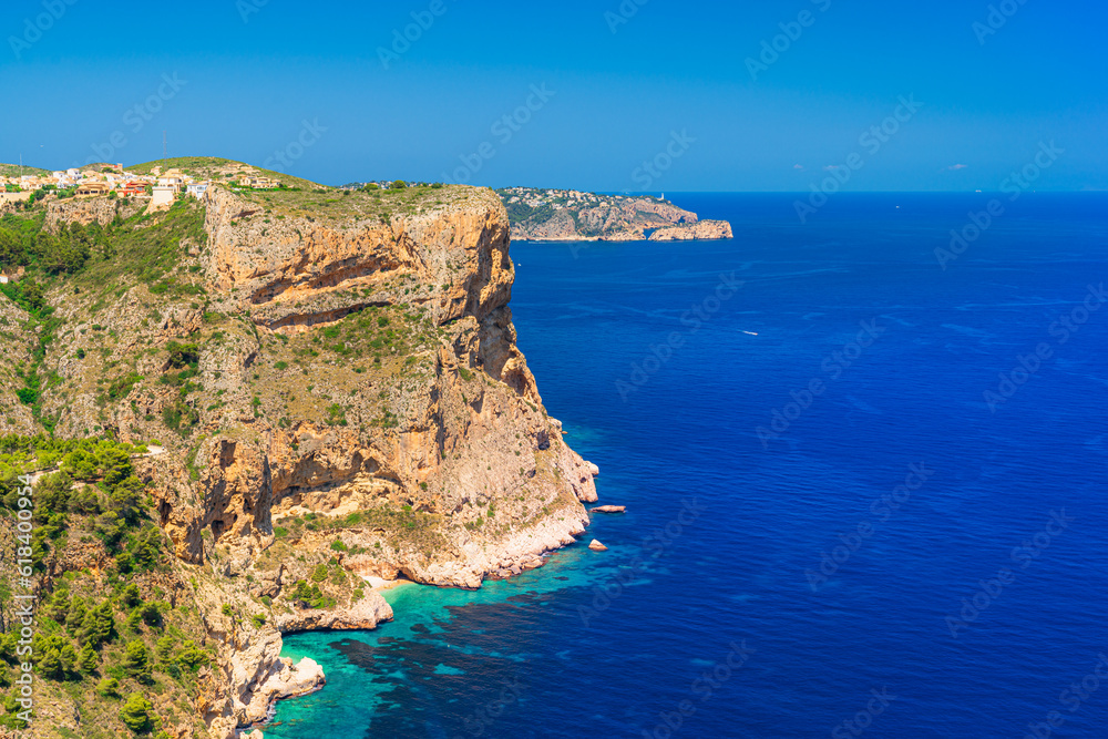 Scenic view of Cala del Moraig turquoise cove in the Mediterranean Sea, Comunidad Valenciana, Spain