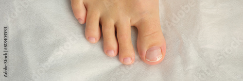 Female foot with pedicure, cosmetic treatment of feet and toenails