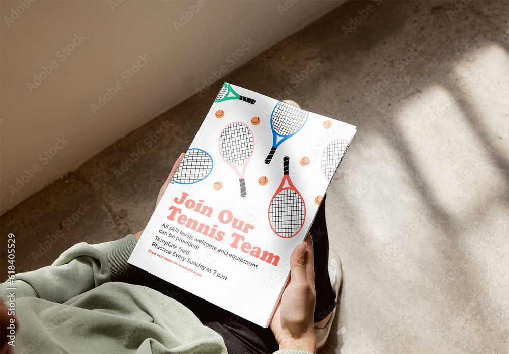 Mockup of person holding closed vertical A4 magazine with customizable ...