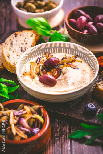 Whipped feta cheese dip with garlic, olives, lemon and caramelized onions.