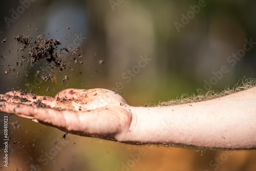 farmer holding soil in his hand on a farm in australia