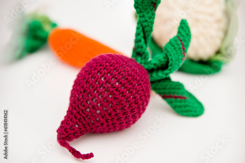 Knitted vegetables: cabbage, carrots, beets, radishes, onions. The concept. Stylization. Handicrafts. Ecological toys for children to develop fine motor skills. Handmade toys. Montessori education.