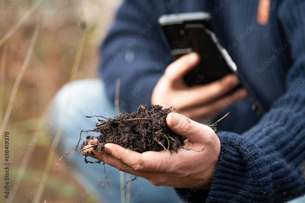 Photo &amp; Art Print regenerative organic farmer, taking soil samples 
