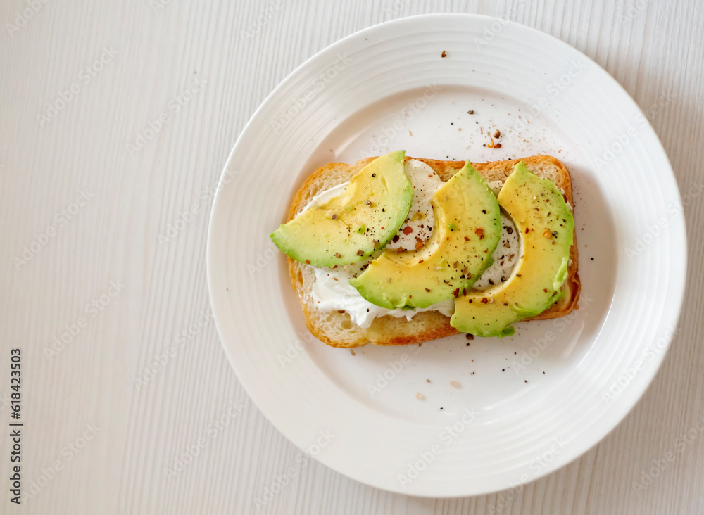 bruschetta with cream cheese and avocado in a plate close-up, with a copy of the space bruschetta with cream cheese and avocado in a plate close-up, with a copy of the space