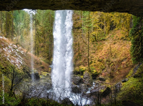 Spectacular view of the Silvery Falls waterfall in a lush green forest in Oregon