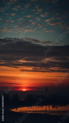 a beautiful sunset in the sky over a landscape in Kurdistan