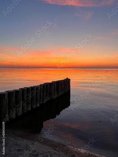 Fototapeta Naklejka Na Ścianę i Meble -  tender evening seascape, orange sea horizon, peaceful sea view