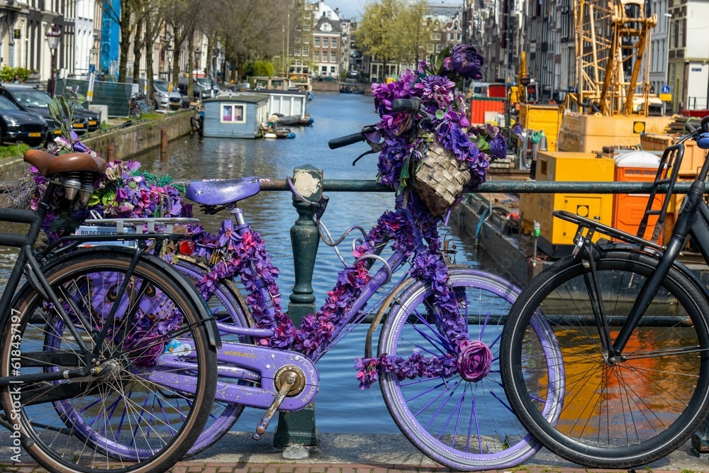Bicycle with a bouquet of vibrant flowers
