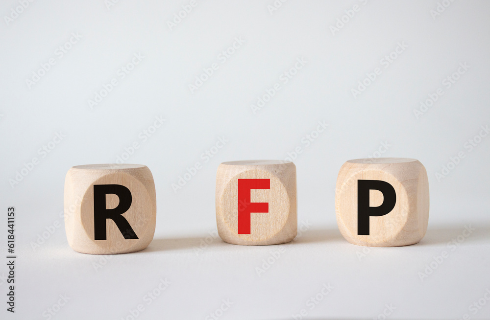 RFP - Request for Proposal. Wooden cubes with word RFP. Beautiful white background. Business and Request for Proposal concept. Copy space. RFP - Request for Proposal. Wooden cubes with word RFP. Beautiful white background. Business and Request for Proposal concept. Copy space.