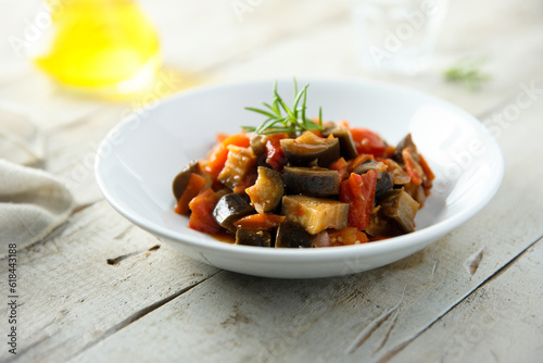 Traditional homemade vegetable ragout with fresh rosemary photo